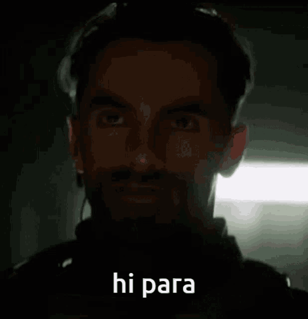 a close up of a man 's face with the words hi para written below him