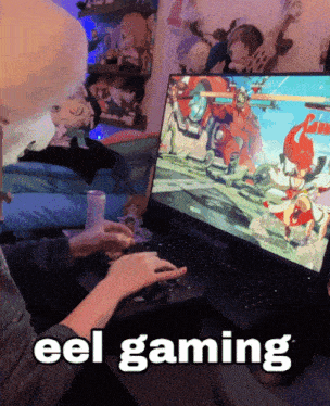 a person playing a video game on a laptop with the words " eel gaming " written on the bottom