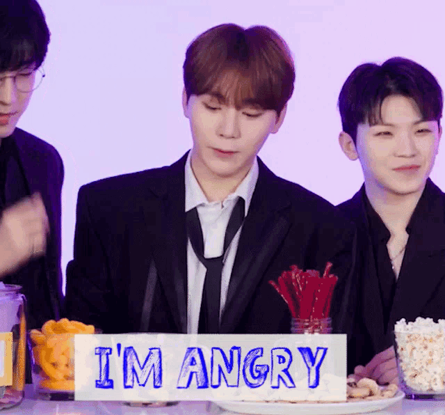 a sign that says i 'm angry in blue letters