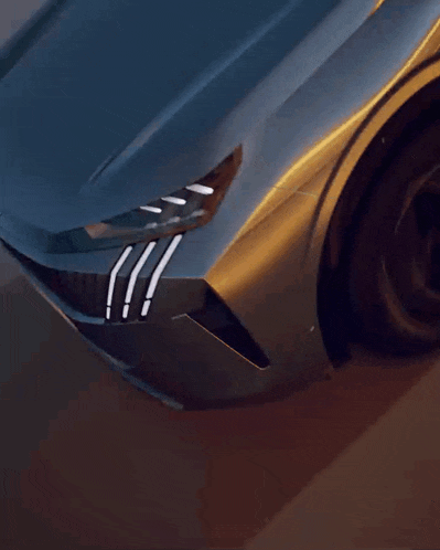 a close up of the front of a car with the word new on the front