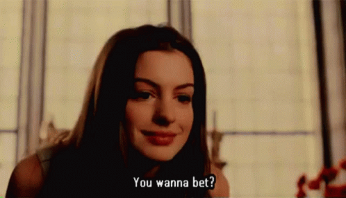 You Wanna Bet Smile GIF - You Wanna Bet Smile Anne Hathaway GIFs