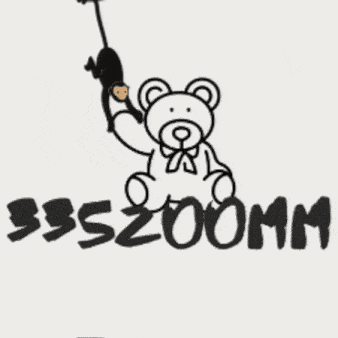a black and white drawing of a teddy bear holding a monkey and the word zoomm below it