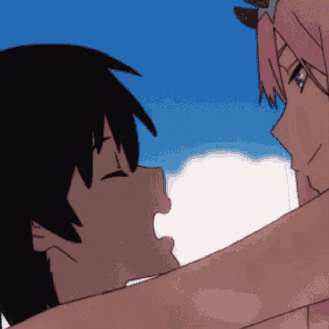 a man and a woman are kissing with a blue sky behind them