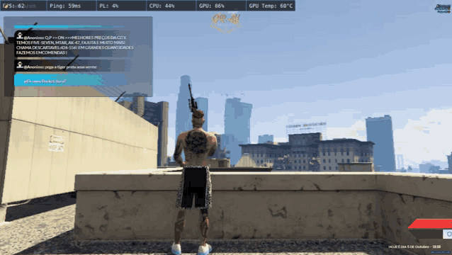 a man with a tattoo on his back is standing in front of a city skyline