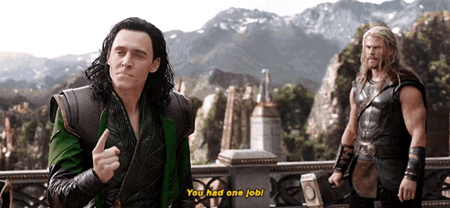 loki and thor are standing next to each other on a bridge and loki is giving a thumbs up .