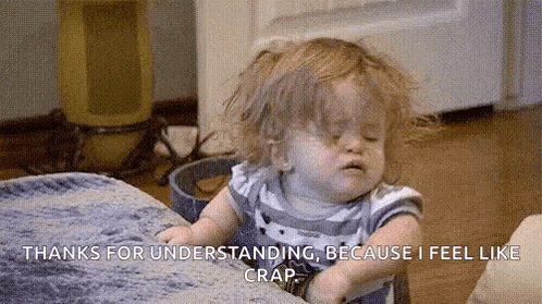 a little girl is sitting on a couch with her eyes closed and says `` thanks for understanding because i feel like crap ''