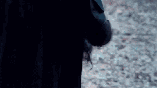 a blurry picture of a person 's arm with blood coming out of it