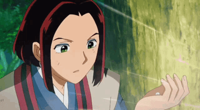 a cartoon character with red hair and green eyes is holding something in her hand