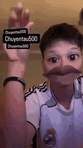 a person wearing a real madrid shirt has a fake mouth