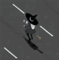 a witch is walking down the street with a broom and a car in the background .
