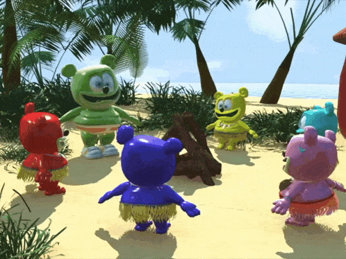 a group of gummy bears wearing hula skirts on a beach