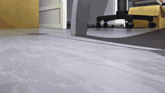a person standing on a tiled floor in a room
