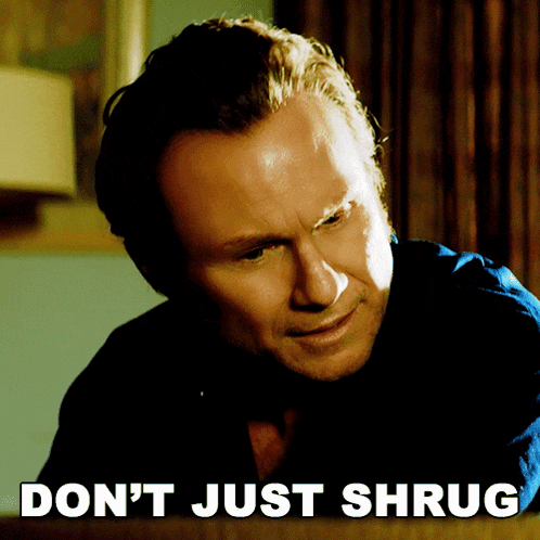 a picture of a man with the words " do n't just shrug " behind him