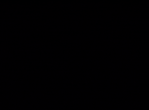 a black car is parked on the side of the road with its door open