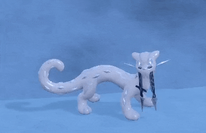 a white leopard is holding two swords in its mouth .