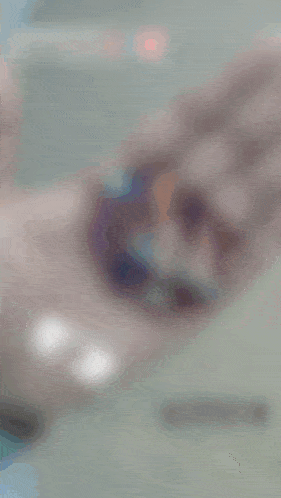 a blurred image of a person in a circle