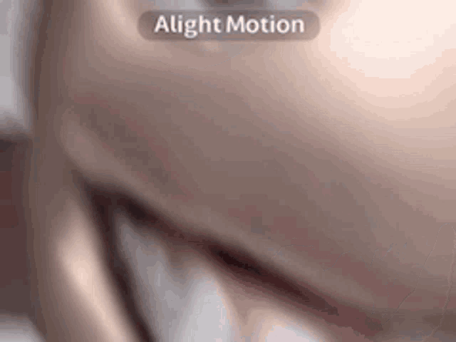 a close up of a person 's face with the words " alight motion " on the bottom