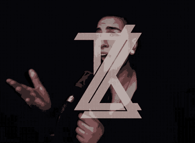 a woman singing into a microphone with the letter z above her head