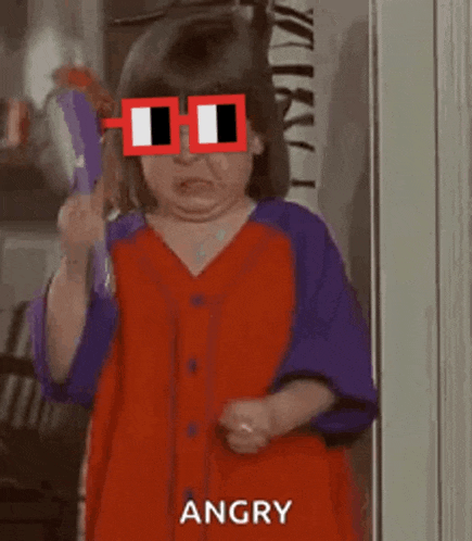 a little girl wearing sunglasses is making a funny face while holding a toy .