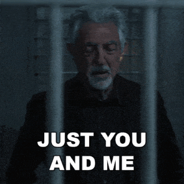 a man behind bars with the words just you and me below him