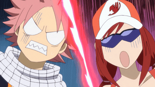 a boy and a girl with fairy tail hats on