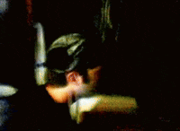 a blurred image of a bullet being fired in the dark