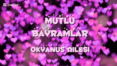 a purple background with the words mutlu bayramlar okyanus ailesi in white letters