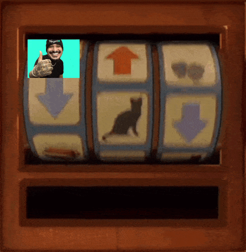 a man giving a thumbs up on a slot machine