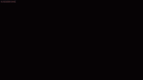 a man in a lab coat is standing in a dark room with a window .