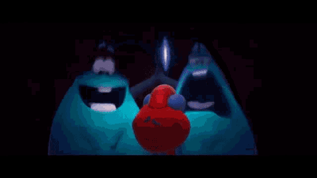 three cartoon characters are standing next to each other in a dark room .