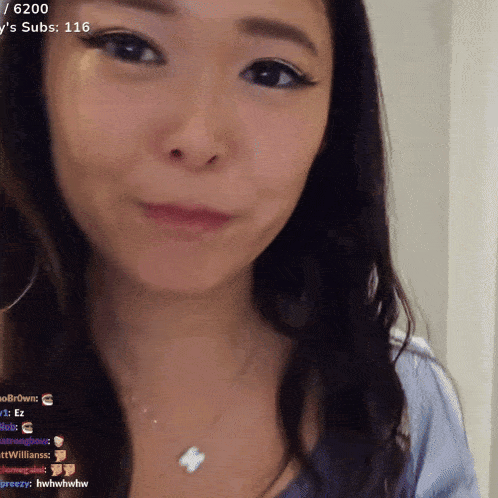 a close up of a woman 's face with 6200 's subs