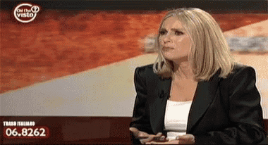 a woman in a black jacket is on a television show called trash italiano