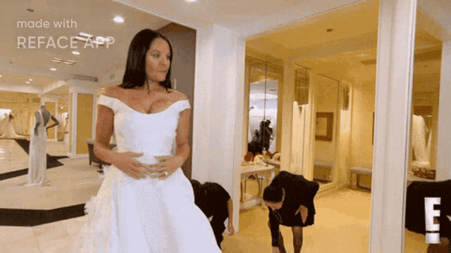 a woman in a white wedding dress is being made with reface app
