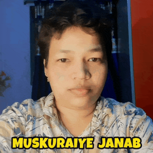 a woman wearing a shirt that says muskuraiye janab