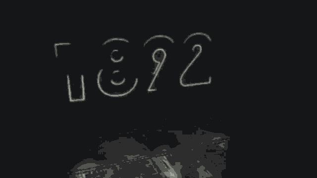 the year 1892 is displayed on a dark background