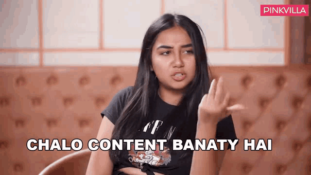 a woman sitting in a chair with the words chalo content banaty hai