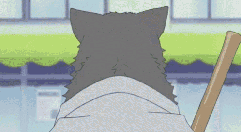 a cartoon cat is holding a baseball bat in its paws