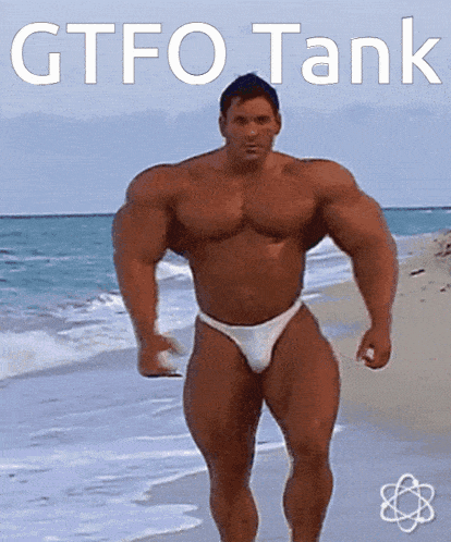 a man in a bikini walking on the beach with the words gtfo tank