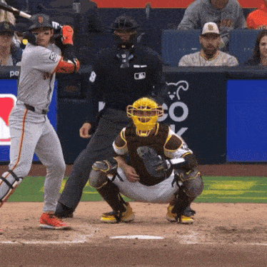 a san francisco giants baseball player prepares to hit the ball