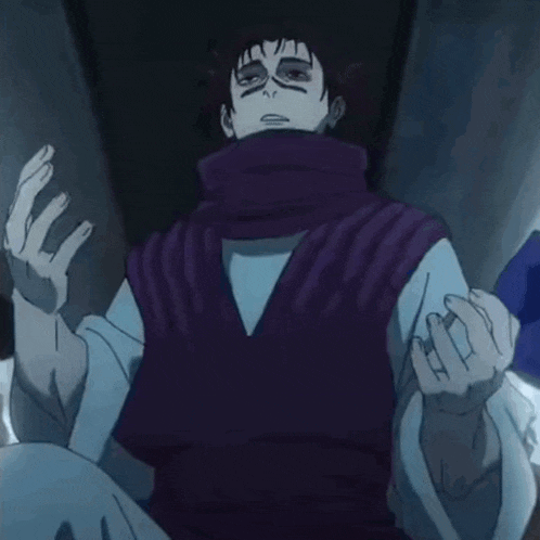 a man in a purple vest and scarf is sitting in a chair with his arms outstretched .