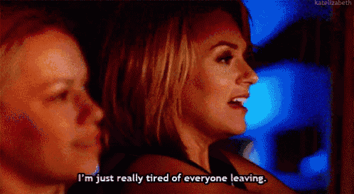 two women are standing next to each other and one of them is saying `` i 'm just really tired of everyone leaving ''