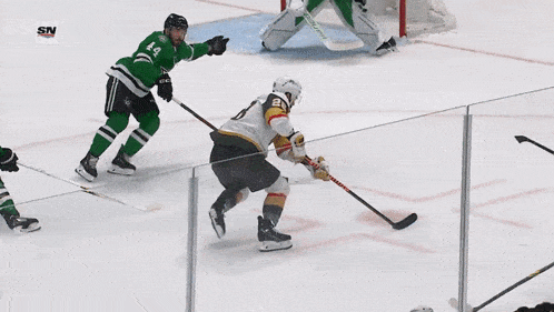 a hockey player with the number 28 on the back of his shirt
