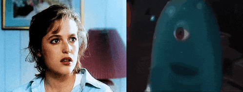 a woman in a blue shirt is next to a picture of a monster