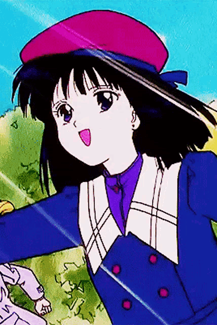 a girl wearing a purple hat and a blue coat
