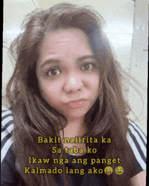 a woman is making a funny face with the words bakit nairita ka sa taba ko ikaw nga ang panget kalmado lang ako