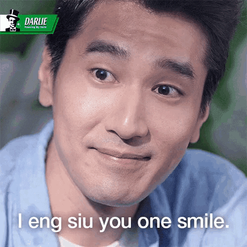 a man is smiling with the words i eng siu you one smile