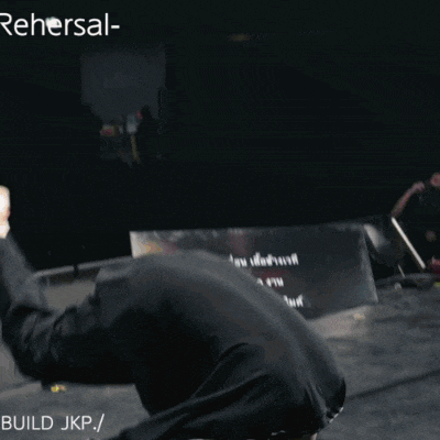 a person is doing a trick with the words rehearsal build jkp written on the bottom