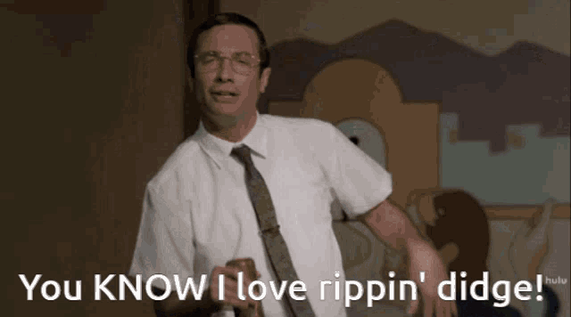 a man in a white shirt and tie says you know i love rippin ' digge