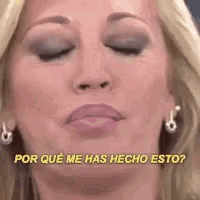 a close up of a woman 's face with her eyes closed and the words `` por que me has hecho esto '' above her .