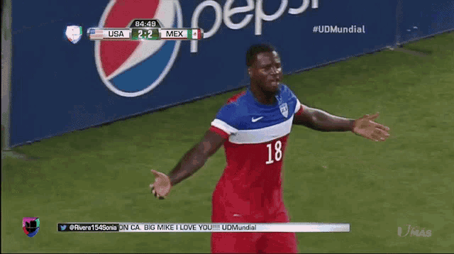 a soccer player in a red white and blue jersey with the number 18 on it